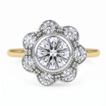 Diamond ring with floral design on a white background
