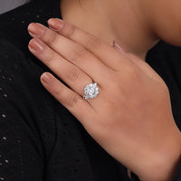 Close-up of a hand wearing a diamond ring on a dark background, Round Moissanite CZ Accent Ring, Unique Nature-Inspired Engagement Ring