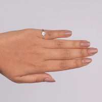 Hand wearing a diamond ring on a plain background, Affordable Heart Shaped Wedding Ring, Dainty Heart Cut Bridal Promise Band, Unique Heart Solitaire Engagement Jewelry