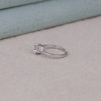 Silver ring with a diamond on a light gray surface, Stunning Heart Cut Moissanite Wedding Band, Romantic Heart Shape Anniversary Ring, Gorgeous Heart Solitaire Moissanite Jewelry