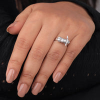 Hand wearing a silver ring with a small animal design on a dark background, Fun Sleepy Eevee Engagement Ring, Gaming Inspired Pokémon Jewelry Ring, Affordable Kawaii Anime Jewelry