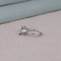 Silver ring with a small animal figure on a light gray surface, Adorable Anime Inspired Fashion Ring, Unique Pokémon Gift For Collectors, Fun Sleepy Eevee Engagement Ring