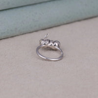 Silver ring with a unique design on a light gray surface, Pikachu Inspired Sleepy Eevee Ring, Pokémon Character Jewelry, Cute Anime Fan Gift Ring, Kawaii Pokémon Jewelry For Women, Sleepy Eevee Cosplay Accessory, Pikachu Themed Pokémon Lover Jewelry