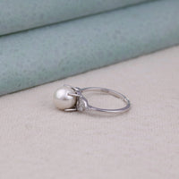 Silver hoop earring with a pearl on a light skin tone surface, Moissanite and Pearl Jewelry, Dainty Nature Ring for Her, Botanical Style Moissanite Ring