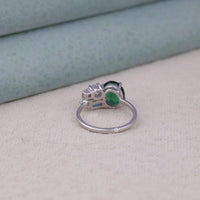 Silver ring with green gemstone on a light gray surface, Green Oval, Aquamarine Baguette & White Pink Round CZ Five Stone Ring, Colorful CZ Engagement Ring