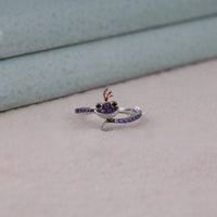 Silver ring with purple gemstones on a light gray surface, Amethyst & Black Onyx CZ Stone Ring – Monster Inspired Fantasy Jewelry Gift