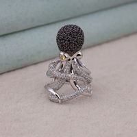 Silver ring with black and clear gemstones on a light background, Unique Octopus Tentacle Ring, Black CZ Head, White CZ Body, Sea Life Inspired Jewelry