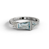 Silver ring with a blue gemstone and diamond on a white background, Aquamarine Tapered Baguette, Round & Triangle CZ Three Stone Minimalist Ring, Dainty Promise or Engagement Ring