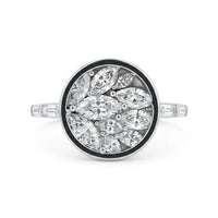 Diamond ring with marquise-shaped stones on a white background