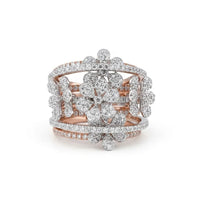 Rose gold and silver floral ring with diamonds on a white background