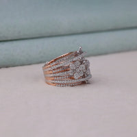 Stack of diamond-studded rings on a neutral background