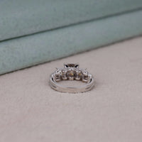 Silver ring with diamond accents on a light surface, Princess Cut Moissanite Wedding Ring – Vintage Antique Design Engagement Jewelry