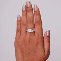 Hand wearing a diamond ring on a plain background, Antique Style Princess Cut Moissanite Ring – Vintage Engagement & Wedding Jewelry