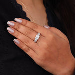 Hand wearing a diamond ring with glittery nail polish on a dark background, Princess Cut Moissanite Vintage Style Engagement Ring – Antique Inspired Wedding Ring