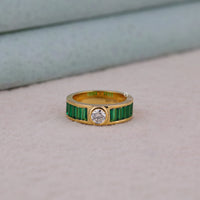 Gold ring with emerald green gemstones on a neutral background, Round CZ and Green Emerald Baguette Ring, Bezel Channel Set Anniversary Jewelry