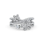 Silver ring with diamond accents on a white background