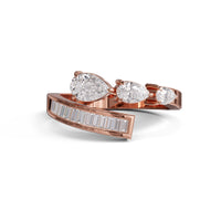 Rose gold ring with pear-shaped and baguette diamonds on a white background, Pear & Baguette Moissanite Bypass Open Gap Ring – Channel Set Modern Statement Ring