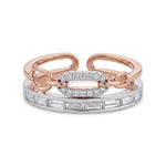 Two rose gold and silver rings with diamond accents on a white background