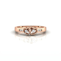 metalcolor:Rose gold ring with interlocking heart design and small diamonds on a white background