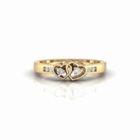metalcolor:yellow Gold ring with interlocking hearts and small diamonds on a white background