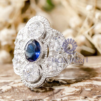 Oval Blue Sapphire Art Deco Vintage-inspired Ring with Round Cut CZ Seven Stone Milgrain