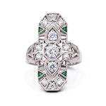 Elegant silver ring with gemstones on a white background