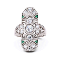 Elegant silver ring with gemstones on a white background