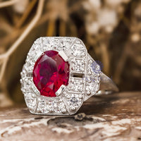 pink oval cut cz stone milgrain bezel set