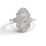 Diamond ring with floral design on a white background, Navette Round Moissanite wedding Ring