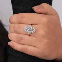 Silver ring with a diamond on a person's finger against a neutral background, Marquise Shape Moissanite Band, Vintage Moissanite Wedding Ring