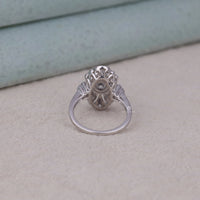 Silver ring with intricate design on a light gray surface, Navette & Round Diamond Alternative Ring, Unique Moissanite Wedding Ring