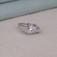 Silver ring with a diamond on a light gray surface, Ethical Moissanite Wedding Ring, Dainty Bypass Moissanite Ring, Moissanite Promise Ring, Moissanite Anniversary Ring, Round Moissanite Solitaire Ba