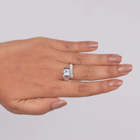 Hand wearing a diamond ring on a plain background, Affordable Moissanite Bridal Ring, Minimalist Moissanite Engagement Ring, Moissanite Bypass Wedding Ring, High Quality Moissanite Jewelry