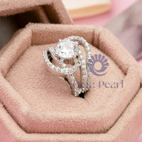 Round Moissanite Swirl & Split Shank Engagement Ring