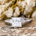 three stone moissanite ring