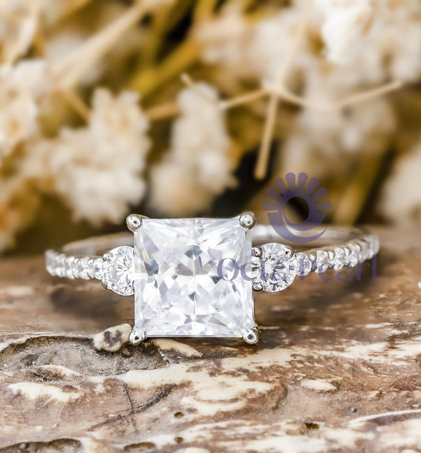 three stone moissanite ring