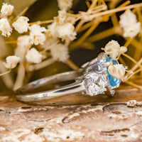 Aquamarine Tri-Stone Wedding Ring With Halo