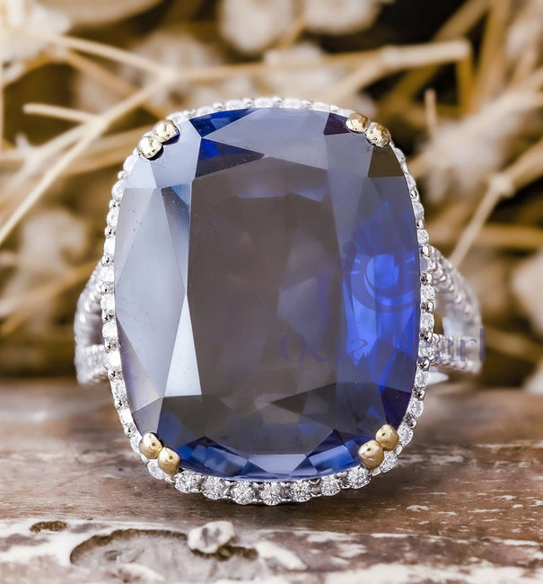 Halo Split Shank Ring With Blue Cushion Cut CZ