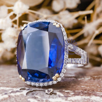 Halo Split Shank Ring With Blue Cushion Cut CZ