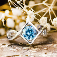 Blue CZ Stone Tension Set Solitaire Engagement Ring