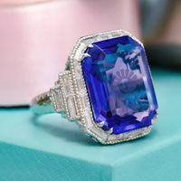 Blue Emerald Cut Halo Art Deco Ring