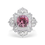 Ring with a pink gemstone and diamond-studded halo on a white background, Pink Cushion & Multi Cut CZ Stone Halo Cocktail Party Wear Ring