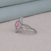 Silver ring with a pink gemstone on a light background, bold cocktail ring for bridal jewelry, anniversary gift pink halo cocktail ring, cz halo cushion cut pink stone fashion ring