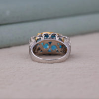 Silver ring with intricate design on a light gray surface, Unique Gift For Comic And Superhero Lovers, Stunning Mythical God Inspired Jewelry, Eye Catching Bold Cocktail Ring Design