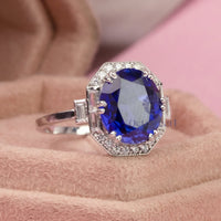 Gorgeous Sapphire Blue Oval With Baguette And Round Cut CZ Stone Art Deco Ring