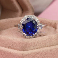 Gorgeous Sapphire Blue Oval With Baguette And Round Cut CZ Stone Art Deco Ring