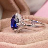 Gorgeous Sapphire Blue Oval With Baguette And Round Cut CZ Stone Art Deco Ring