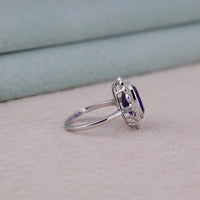 Silver ring with a purple gemstone on a light gray background, Blue Sapphire Cushion Cut CZ Stone Milgrain Halo Vintage Art Deco Ring, Cushion Cut Sapphire Blue CZ Engagement Ring