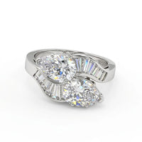 Diamond ring with a heart-shaped design on a white background