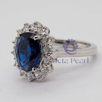 Blue Oval-Cut CZ Wedding Ring With Sunburst Halo